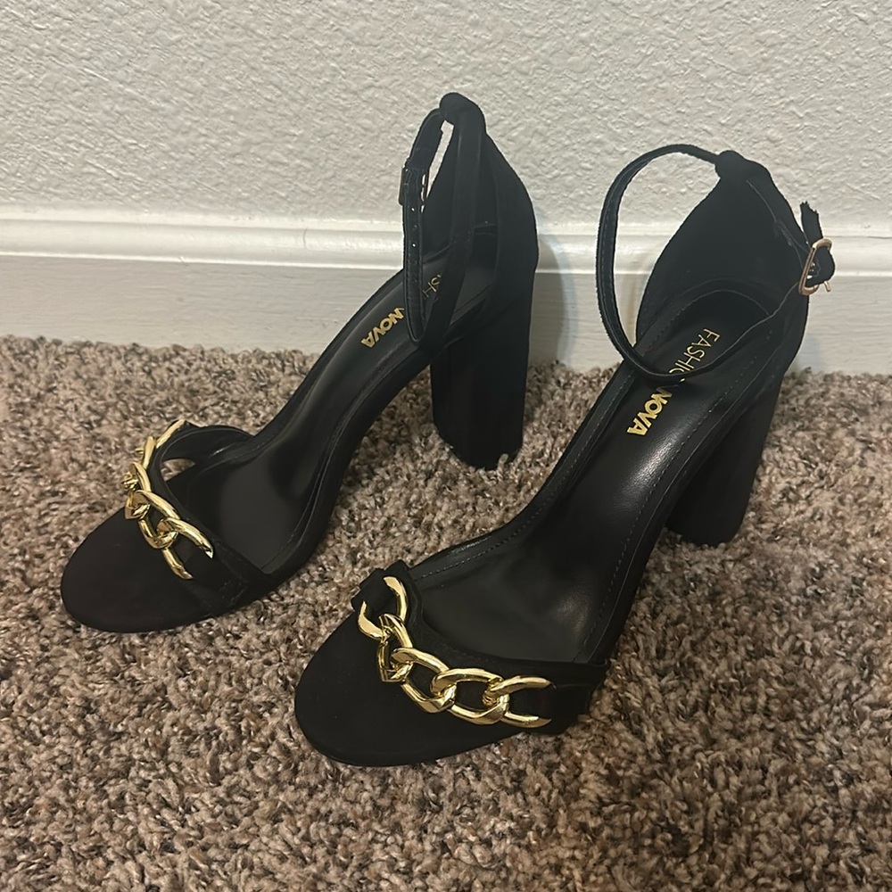 Black heels with gold chain strap